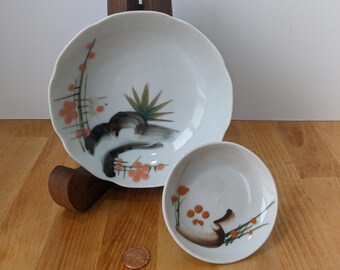 Delicately expressive painted glaze work sings in these two naturalistic unmarked Asian dishes.