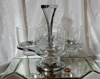 Vintage chrome and teak caddy that hold four sparkling pedestal cups/glasses for condiments, desserts, drinks, charcuterie treats & more!