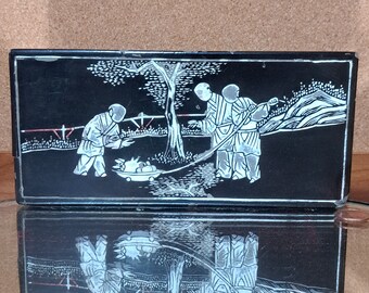 Evocative old Chinese lacquer box in black and white with remnants of red...it is in poor condition but still lovely--3 monks pulling fruit