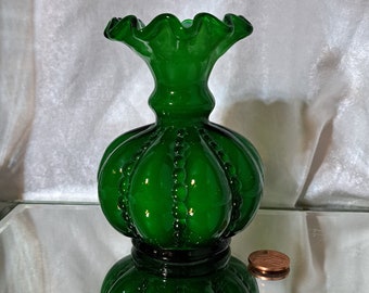 Fenton deep green beaded melon vase with a generous base and a ruffled top--cased glass--very uncommon. Made in Williamstown, West Virginia.