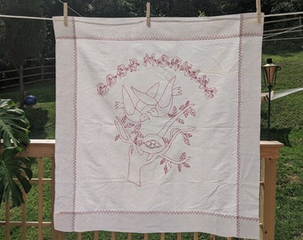 Folk art birds watch over their nest under the banner of &quot;Good Morning&quot; in this crazy good table cloth, frame-able.