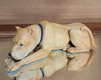 Parianware or porcelain statue of a Cane Corso very well done, the dog appears both wary and calm, 7.25" long. Likely English.