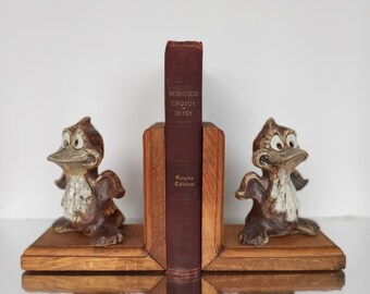 Darling, original, handmade, signed pottery and wood bookends--these will brighten your day with a bit of quirky fun.