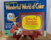 Three fabulous 1950s coloring books, By the Brook, Happy Pals Walt Disney 39 s Wonderful World of Color many pages untouched.