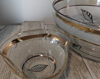 Fresh looking Retro bowl set in gold & robin's egg blue with frosted bead trim, leaf embellishment. Really clean, mid century look.