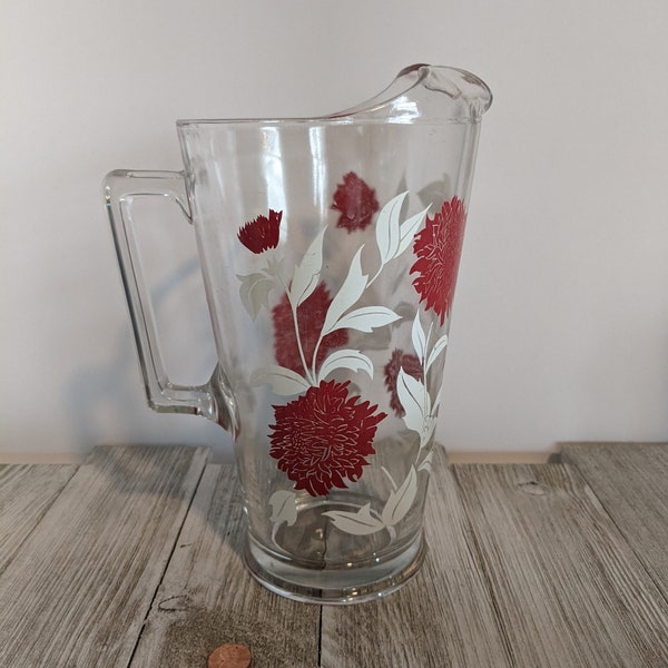 Chrysanthemum, carnation or dahlia? Regardless this 1950s pitcher would look sweet with tea, lemonade or water any time.