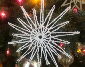 Four pointy snowflake ornaments