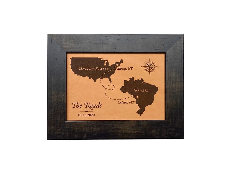 Long distance love journey map between two countries. This custom leather love map shows the distance traveled to meet and be together between the United States and Brazil. Engraved on leather for a 3rd anniversary and framed and ready to gift.