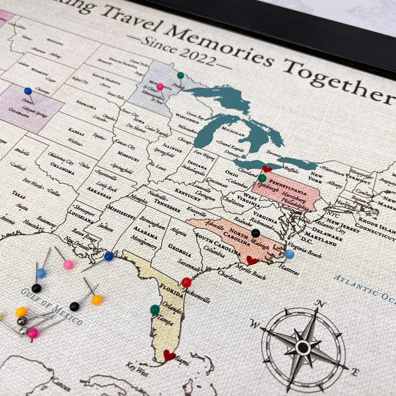 Personalized USA push pin map on 100% cotton canvas, 11x14 inches with optional frame. Featuring DIY watercolor friendly states and 100 travel pins to color in and mark all of your United States travels. A meaningful 2nd anniversary or holiday gift for travelers. This map is perfect for tracking past trips and inspiring future adventures.