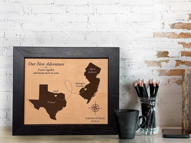 Our journey leather map features a love story keepsake.  Custom designed and personalized. This leather map is the perfect anniversary gift for him or her. Framed and ready to hang, the sample image shows the journey between Texas and New Jersey