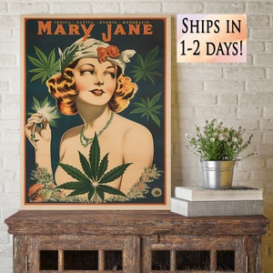 May include: Vintage style poster advertising Mary Jane with a woman holding a marijuana leaf. The poster has a dark blue background with green marijuana leaves and flowers. The text on the poster reads "Indica - Sativa - Hybrid - Ruderalis Mary Jane".