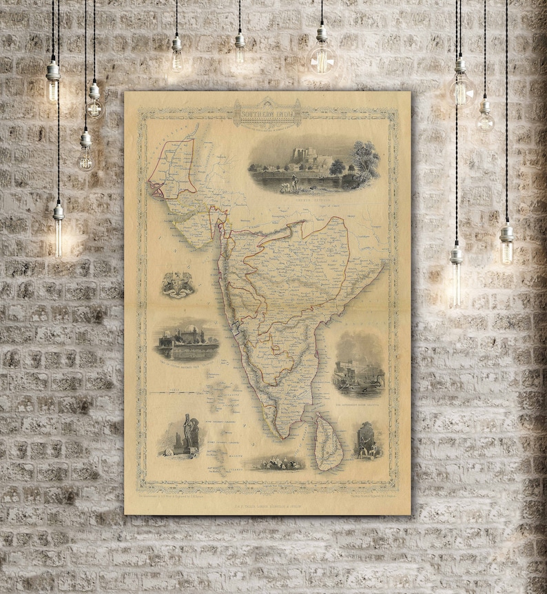 May include: An antique map of Southern India, printed in black and white with red and brown accents. The map shows the different regions of Southern India, including Madras, Mysore, and Ceylon. The map is surrounded by a decorative border and includes several small illustrations of important landmarks.
