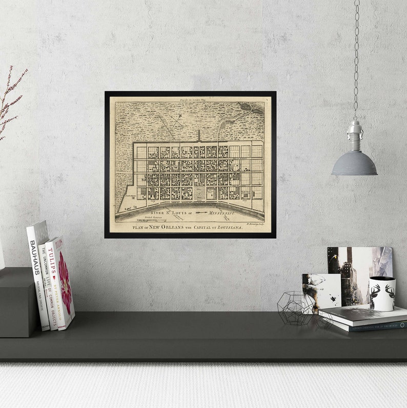 May include: A vintage black and white map of New Orleans, Louisiana, with the text "PLAN of NEW ORLEANS the CAPITAL of LOUISIANA." printed at the bottom.