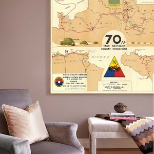 May include: A vintage map showing the combat operations of the 70th Tank Battalion during World War II. The map shows the battalion's movements in Europe and North Africa, including campaigns in Algeria, French Morocco, Tunisia, and Sicily. The map is titled "70th Tank Battalion Combat Operations" and includes the text "Official" and "Henry E. Davidson, Jr. Commanding."