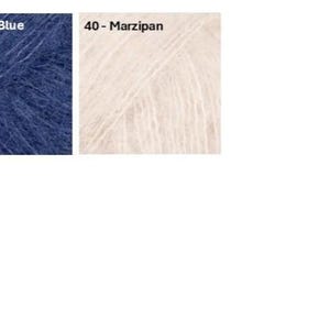 May include: Two square swatches of yarn. The left swatch is navy blue, labeled "39 - Navy Blue." The right swatch is off-white, labeled "40 - Marzipan." Both swatches display the texture of the yarn.