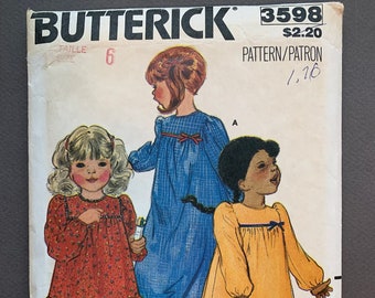 Vintage 1970s Butterick 3598 Girls Dress, round Neck, Yoke, Long Gathered Sleeves, Gathered Skirt with Ruffle, Button Closure, Ribbon Trim.