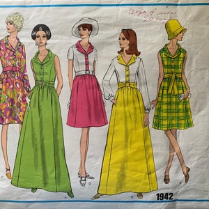 May include: A vintage sewing pattern for a dress with four different styles. The pattern is from Vogue's Basic Design and is dated 1942. The dress styles include a short-sleeved dress with a floral print, a sleeveless dress with a solid green color, a short-sleeved dress with a pink skirt, and a long-sleeved dress with a yellow skirt.