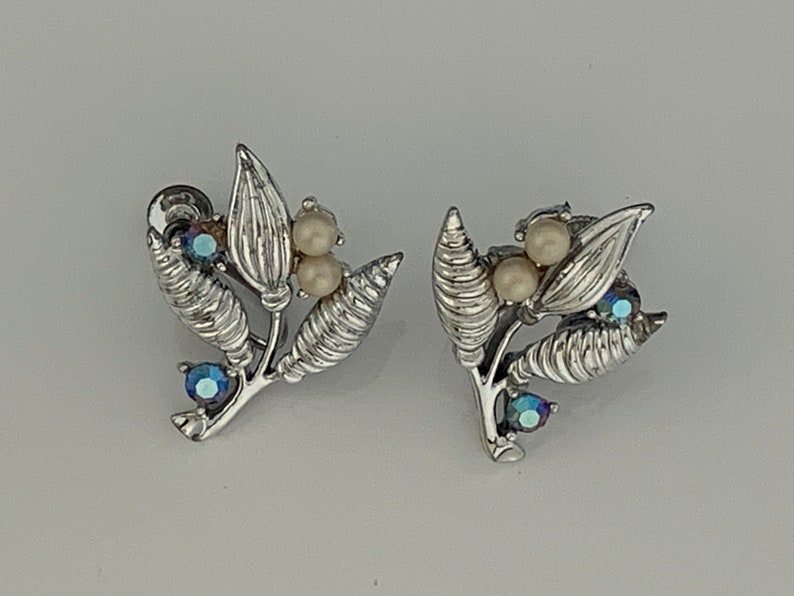 Silver Coloured Metal Leaves And Flower Bud With Pearl And Aurora Borealis Accents. Vintage 1950s Screw Back Earrings