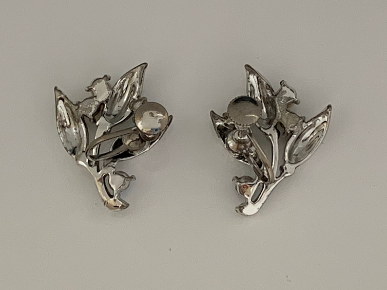 Silver Coloured Metal Leaves And Flower Bud With Pearl And Aurora Borealis Accents. Vintage 1950s Screw Back Earrings