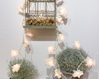 String of lights with 20 lanterns made of handmade paper motif angel, fir, star.