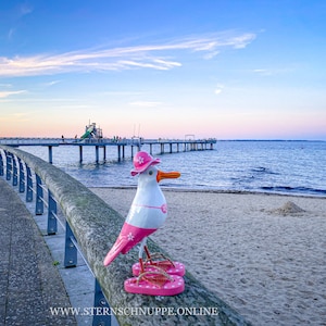 Seagull made of carved wood in pink bikini with flip-flops approx. 25cm high