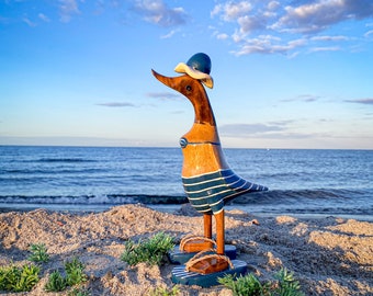 Running duck with hat and flip flops in dark blue and white striped bikini 28 cm high