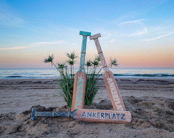 Wooden paddle with text "Anchorage" approx. 80 cm long