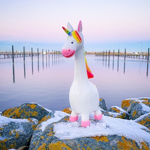 Unicorn made of wood painted with rainbow mane about 12 cm high