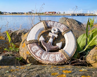 Life ring anchor made of wood antique white with text "Meerglück" approx. 30 x 30 cm.