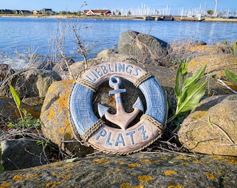 Life ring anchor made of wood antique blue with text "Favorite place" approx. 30 x 30 cm.
