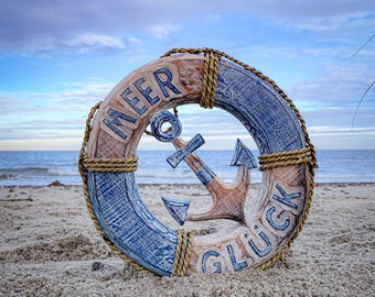 Lifebuoy anchor made of wood ANTIQUE BLUE with text "Sea Happiness" approx. 30 x 30 cm.
