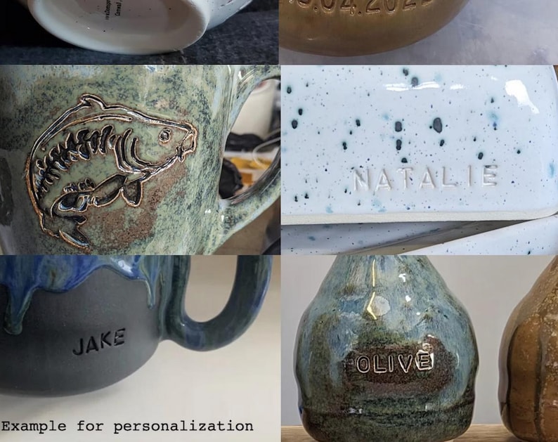 Puede incluir: Una colecci&oacute;n de art&iacute;culos de cer&aacute;mica hechos a mano, que incluyen tazas y jarrones, con texto personalizado. Las tazas presentan un dise&ntilde;o de pez y el nombre "Jake". Los jarrones est&aacute;n inscritos con el nombre "Olive". Los art&iacute;culos tienen un acabado r&uacute;stico y vidriado.