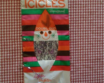 Vintage NOS DOUBL GLO Icicles  Silver Tinsel 18 inches long Made in United States Price says 29 cents