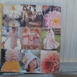 May include: A McCall's magazine cover featuring a collage of images with a floral theme. The cover text reads "Early Spring" and "In Bloom... A fresh new season".