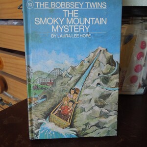 The Bobbsey Twins The Smoky Mountain Mystery by Laura Lee Hope copyright 1977 printed in the USA by Grosset & Dunlap
