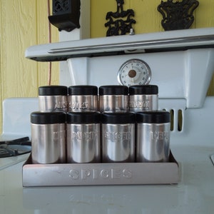 Vintage metal copper and black spice rack Great shape