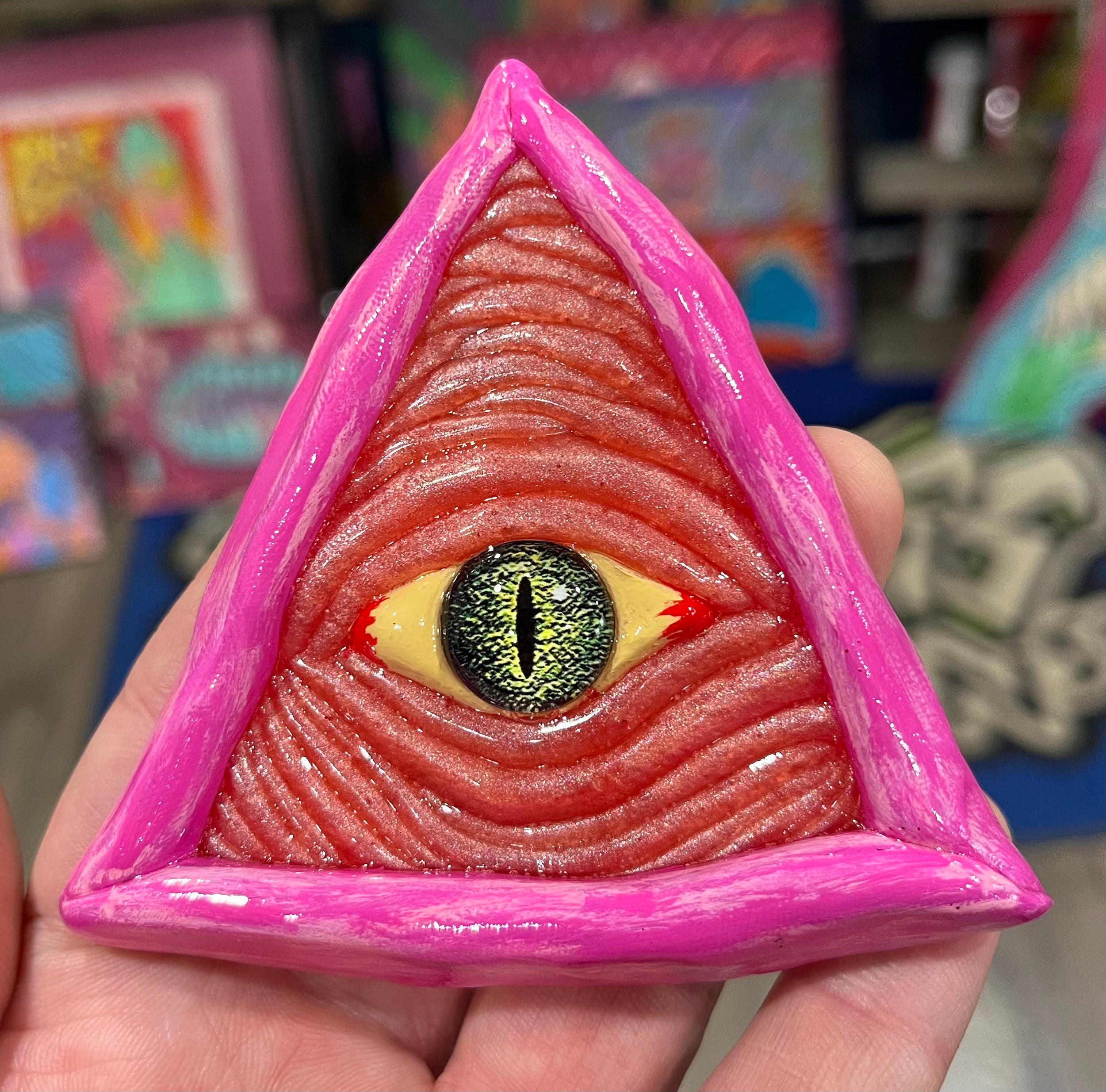 Pink all seeing reptilian eye magnet