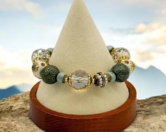 Glass, Metal, And Ceramic Beaded Bracelet with antique brass lobster clasp