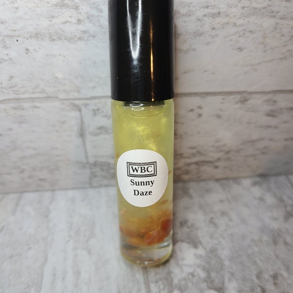 Sunny Daze tropical flower scented crystal infused essential oil roller.