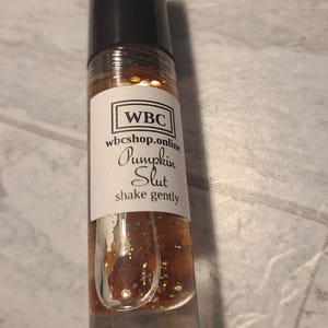 Pumpkin Slut, fall fragrance oil roller with carnelian crystal chips