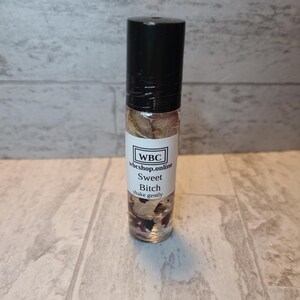 Sweet Bitch cotton candy scented crystal infused essential oil roller.
