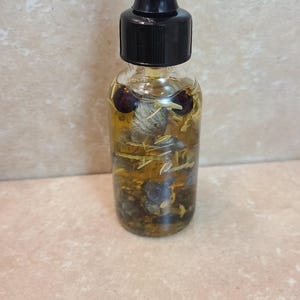 Intention oils 1oz dropper bottle of crystal and herbal infused oils