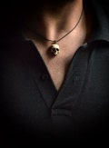 Unisex Skull necklace - Synthetic ivory skull on brown Waxed Polyester Cord