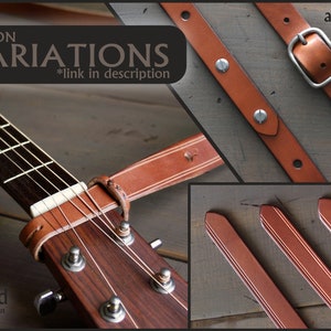 Puede incluir: Una correa de guitarra de cuero marr&oacute;n con opciones de ajuste y ribete lineal. La correa est&aacute; dise&ntilde;ada para instrumentos sin pasador de correa secundario. La imagen incluye el texto "ADD-ON VARIATIONS *link in description".