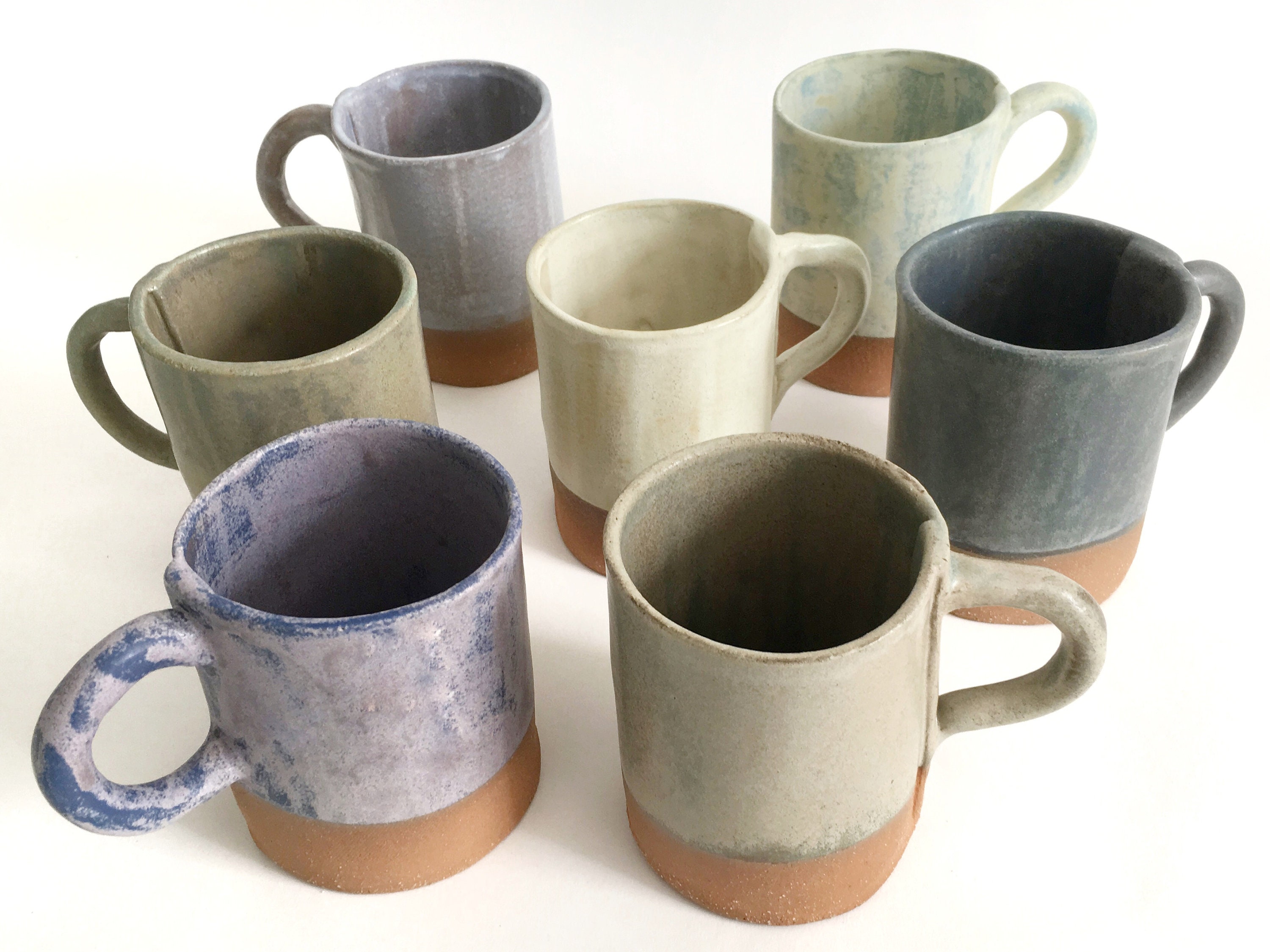 Handmade ceramic mug with fern leaf pattern on bottom and blue glaze inside Large pottery coffeetea mug