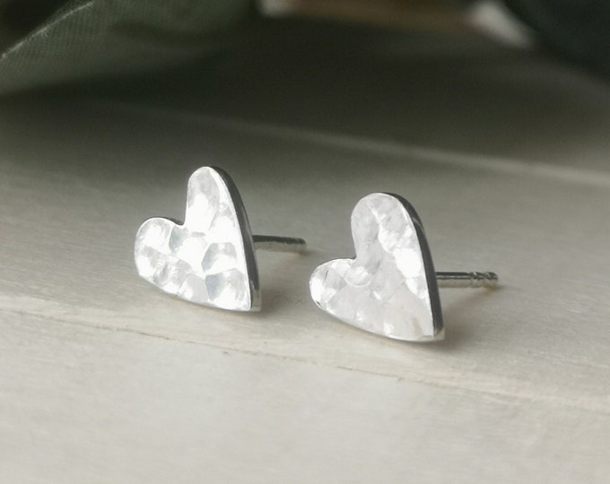 Hammered heart earrings crafted in sterling silver for women