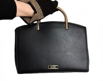 BCBG black vegan leather purse / sculptural gold tone top handle handbag / shoulder bag