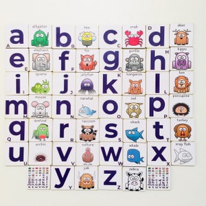 May include: A set of colorful alphabet blocks with animal illustrations. Each block features a letter of the alphabet, an animal name, and a cartoon animal image. The blocks are arranged in alphabetical order.