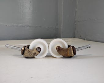 Two Vintage Casters with Swivel Bearing White Furniture Wheel Plastic Furniture Hardware Marked Bassick  RhymeswithDaughter
