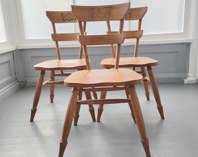 Featured listing image: Vintage Mid-Century Solid Oak Dining Chairs with Carved Motif - Rustic Farmhouse Ercol Style Kitchen Seating - Set of 3